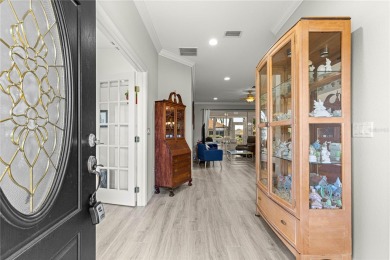 Beautifully updated and modified Granville model boasts on Eagle Ridge At Spruce Creek Country Club in Florida - for sale on GolfHomes.com, golf home, golf lot