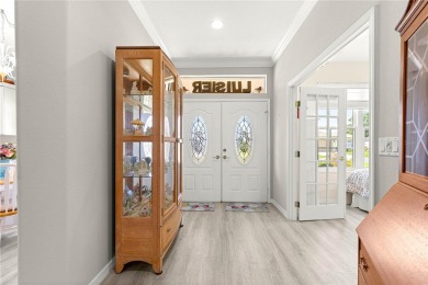 Beautifully updated and modified Granville model boasts on Eagle Ridge At Spruce Creek Country Club in Florida - for sale on GolfHomes.com, golf home, golf lot