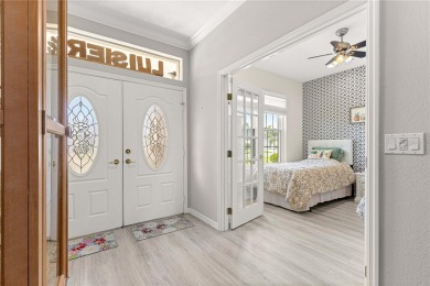 Beautifully updated and modified Granville model boasts on Eagle Ridge At Spruce Creek Country Club in Florida - for sale on GolfHomes.com, golf home, golf lot