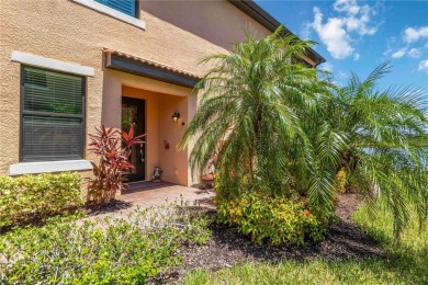 Stunning Ground-Floor Condo with Water Views in Sarasota on Sarasota National Golf Club in Florida - for sale on GolfHomes.com, golf home, golf lot