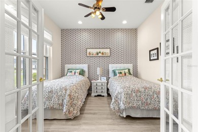 Beautifully updated and modified Granville model boasts on Eagle Ridge At Spruce Creek Country Club in Florida - for sale on GolfHomes.com, golf home, golf lot