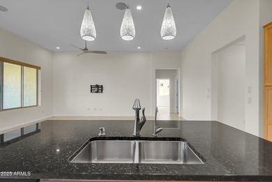 Imagine waking up in a sunlit, stylish space that feels both on Tuscany Falls At Pebble Creek in Arizona - for sale on GolfHomes.com, golf home, golf lot