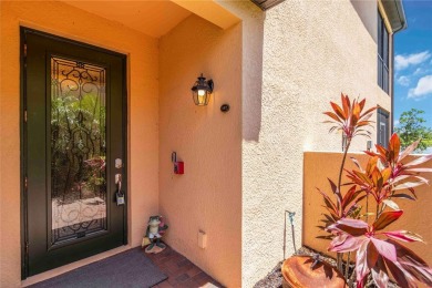 Stunning Ground-Floor Condo with Water Views in Sarasota on Sarasota National Golf Club in Florida - for sale on GolfHomes.com, golf home, golf lot