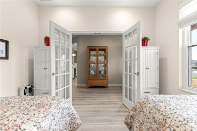 Beautifully updated and modified Granville model boasts on Eagle Ridge At Spruce Creek Country Club in Florida - for sale on GolfHomes.com, golf home, golf lot