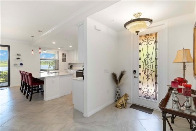 Stunning Ground-Floor Condo with Water Views in Sarasota on Sarasota National Golf Club in Florida - for sale on GolfHomes.com, golf home, golf lot