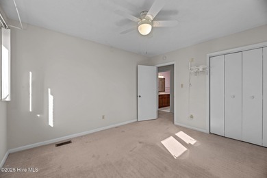 Experience unparalleled waterfront living in this waterfront on Harbour Point Golf Club in North Carolina - for sale on GolfHomes.com, golf home, golf lot