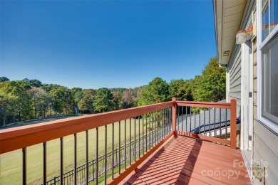 Enjoy the stunning golf course views that this townhome offers on Tega Cay Golf Club in South Carolina - for sale on GolfHomes.com, golf home, golf lot