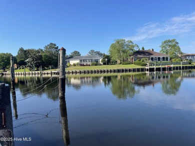 Experience unparalleled waterfront living in this waterfront on Harbour Point Golf Club in North Carolina - for sale on GolfHomes.com, golf home, golf lot