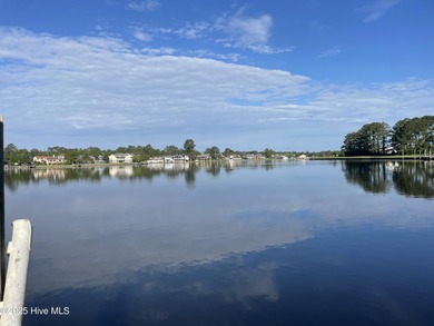 Experience unparalleled waterfront living in this waterfront on Harbour Point Golf Club in North Carolina - for sale on GolfHomes.com, golf home, golf lot