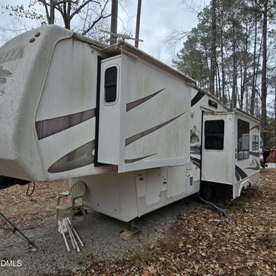 Beautiful camping lot located in the gated Lake Royale on River Golf and Country Club at Lake Royale in North Carolina - for sale on GolfHomes.com, golf home, golf lot