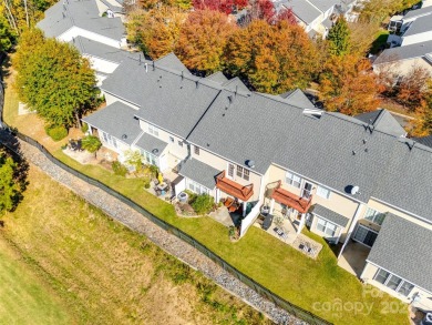 Enjoy the stunning golf course views that this townhome offers on Tega Cay Golf Club in South Carolina - for sale on GolfHomes.com, golf home, golf lot