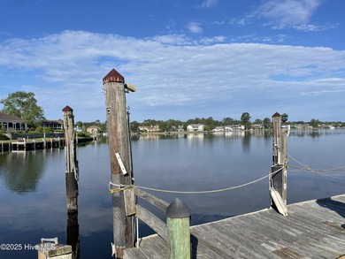 Experience unparalleled waterfront living in this waterfront on Harbour Point Golf Club in North Carolina - for sale on GolfHomes.com, golf home, golf lot