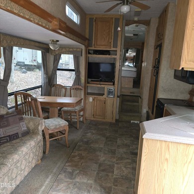 Beautiful camping lot located in the gated Lake Royale on River Golf and Country Club at Lake Royale in North Carolina - for sale on GolfHomes.com, golf home, golf lot