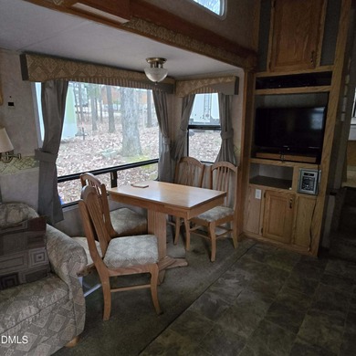 Beautiful camping lot located in the gated Lake Royale on River Golf and Country Club at Lake Royale in North Carolina - for sale on GolfHomes.com, golf home, golf lot