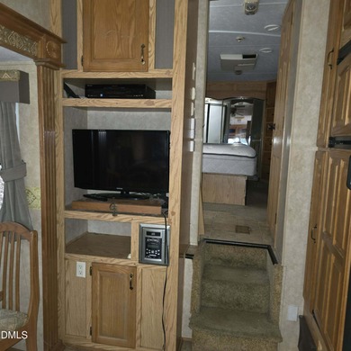 Beautiful camping lot located in the gated Lake Royale on River Golf and Country Club at Lake Royale in North Carolina - for sale on GolfHomes.com, golf home, golf lot