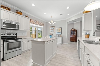Beautifully updated and modified Granville model boasts on Eagle Ridge At Spruce Creek Country Club in Florida - for sale on GolfHomes.com, golf home, golf lot