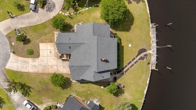 Experience unparalleled waterfront living in this waterfront on Harbour Point Golf Club in North Carolina - for sale on GolfHomes.com, golf home, golf lot