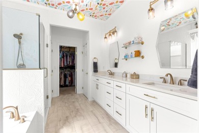 Beautifully updated and modified Granville model boasts on Eagle Ridge At Spruce Creek Country Club in Florida - for sale on GolfHomes.com, golf home, golf lot
