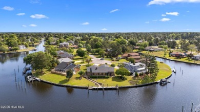 Experience unparalleled waterfront living in this waterfront on Harbour Point Golf Club in North Carolina - for sale on GolfHomes.com, golf home, golf lot