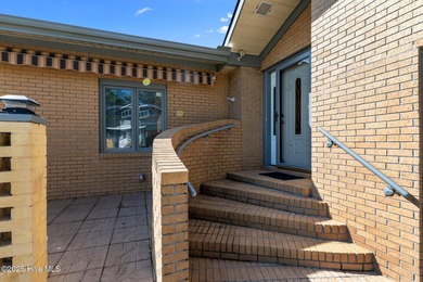 Experience unparalleled waterfront living in this waterfront on Harbour Point Golf Club in North Carolina - for sale on GolfHomes.com, golf home, golf lot