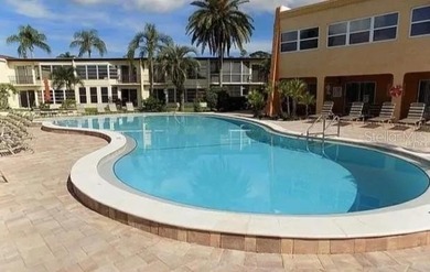 PARADISE!   This classy serene spacious Condo has a panoramic on East Bay Golf Club in Florida - for sale on GolfHomes.com, golf home, golf lot