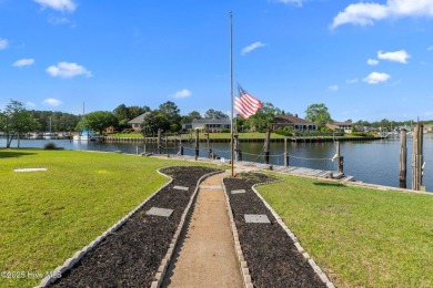 Experience unparalleled waterfront living in this waterfront on Harbour Point Golf Club in North Carolina - for sale on GolfHomes.com, golf home, golf lot