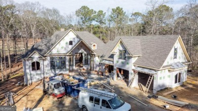 Introducing a New Construction luxurious custom home nestled in on Reynolds Lake Oconee - The Oconee in Georgia - for sale on GolfHomes.com, golf home, golf lot