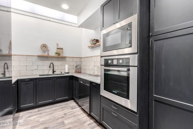 Step inside this exquisitely remodeled home where every surface on Gainey Ranch Golf Club in Arizona - for sale on GolfHomes.com, golf home, golf lot
