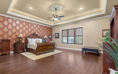 Stunning all-brick and stone lakefront home on Lake Granada in on Granada Golf Course in Arkansas - for sale on GolfHomes.com, golf home, golf lot