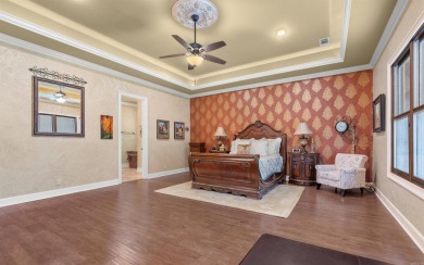 Stunning all-brick and stone lakefront home on Lake Granada in on Granada Golf Course in Arkansas - for sale on GolfHomes.com, golf home, golf lot