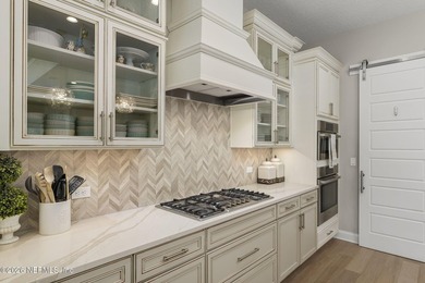 Refined Luxury in Palencia From the moment you walk through the on The Palencia Club in Florida - for sale on GolfHomes.com, golf home, golf lot