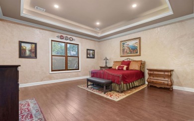Stunning all-brick and stone lakefront home on Lake Granada in on Granada Golf Course in Arkansas - for sale on GolfHomes.com, golf home, golf lot