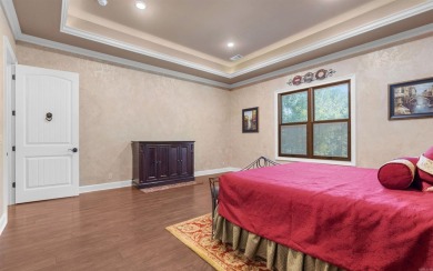 Stunning all-brick and stone lakefront home on Lake Granada in on Granada Golf Course in Arkansas - for sale on GolfHomes.com, golf home, golf lot
