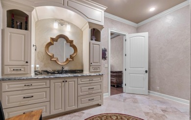 Stunning all-brick and stone lakefront home on Lake Granada in on Granada Golf Course in Arkansas - for sale on GolfHomes.com, golf home, golf lot