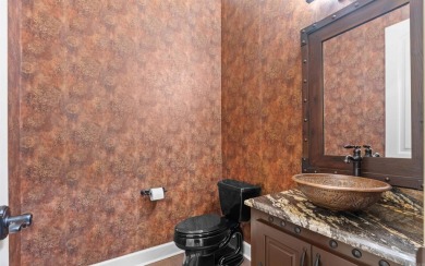 Stunning all-brick and stone lakefront home on Lake Granada in on Granada Golf Course in Arkansas - for sale on GolfHomes.com, golf home, golf lot