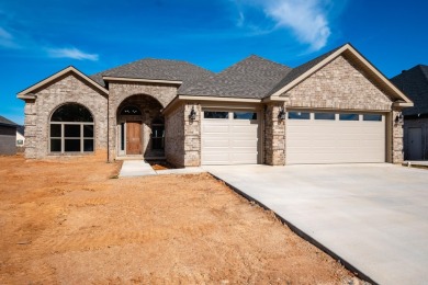 Beautiful ALL BRICK NEW CONSTRUCTION one level home sits on on The Country Club of Arkansas in Arkansas - for sale on GolfHomes.com, golf home, golf lot