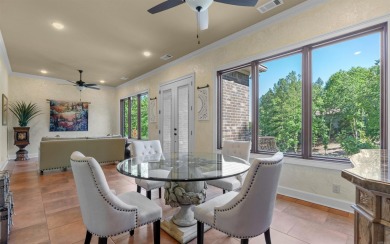 Stunning all-brick and stone lakefront home on Lake Granada in on Granada Golf Course in Arkansas - for sale on GolfHomes.com, golf home, golf lot