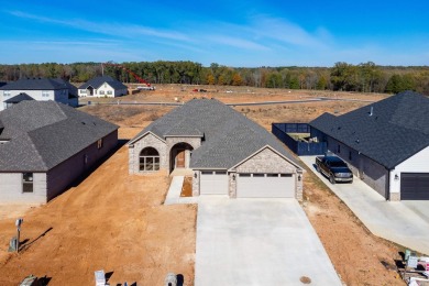 Beautiful ALL BRICK NEW CONSTRUCTION one level home sits on on The Country Club of Arkansas in Arkansas - for sale on GolfHomes.com, golf home, golf lot