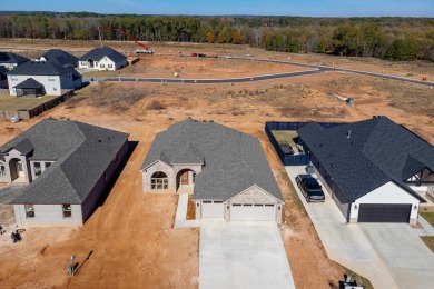 Beautiful ALL BRICK NEW CONSTRUCTION one level home sits on on The Country Club of Arkansas in Arkansas - for sale on GolfHomes.com, golf home, golf lot