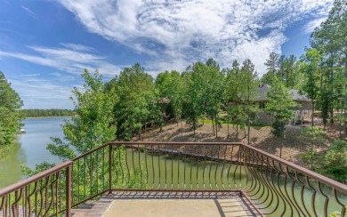Stunning all-brick and stone lakefront home on Lake Granada in on Granada Golf Course in Arkansas - for sale on GolfHomes.com, golf home, golf lot