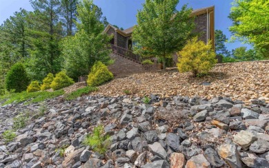 Stunning all-brick and stone lakefront home on Lake Granada in on Granada Golf Course in Arkansas - for sale on GolfHomes.com, golf home, golf lot