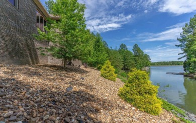 Stunning all-brick and stone lakefront home on Lake Granada in on Granada Golf Course in Arkansas - for sale on GolfHomes.com, golf home, golf lot
