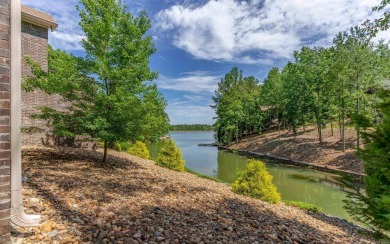 Stunning all-brick and stone lakefront home on Lake Granada in on Granada Golf Course in Arkansas - for sale on GolfHomes.com, golf home, golf lot