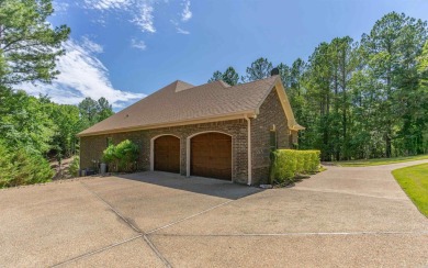 Stunning all-brick and stone lakefront home on Lake Granada in on Granada Golf Course in Arkansas - for sale on GolfHomes.com, golf home, golf lot