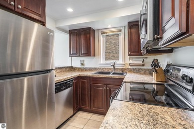 Enjoy resort-style living in this beautifully updated 2-bedroom on  in Michigan - for sale on GolfHomes.com, golf home, golf lot