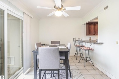 Enjoy resort-style living in this beautifully updated 2-bedroom on  in Michigan - for sale on GolfHomes.com, golf home, golf lot