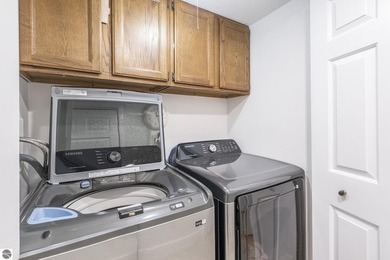 Enjoy resort-style living in this beautifully updated 2-bedroom on  in Michigan - for sale on GolfHomes.com, golf home, golf lot