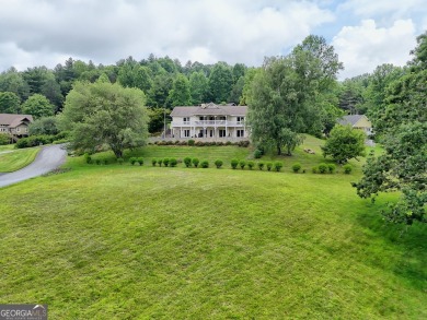 This beautiful, expansive, 4 bedroom, 5.5 bath home with a on Sky Valley Resort and Country Club in Georgia - for sale on GolfHomes.com, golf home, golf lot