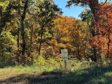 If you are searching for a beautiful lot to build your dream on Missouri Bluffs Golf Club in Missouri - for sale on GolfHomes.com, golf home, golf lot