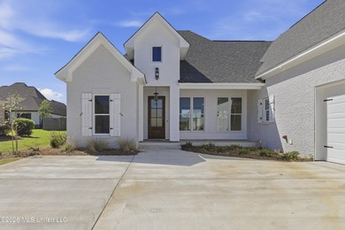Stunning new construction in the best location possible: Lake on Lake Caroline Golf Club in Mississippi - for sale on GolfHomes.com, golf home, golf lot